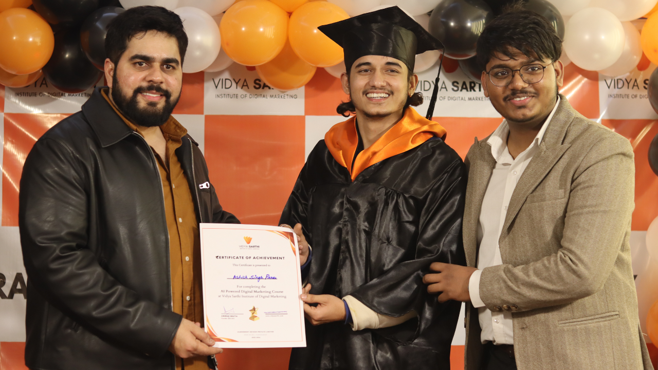 Students holding certificates after course completion